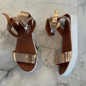 Gorgeous rose gold shiny MIA sandals